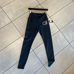 Beyond yoga black/gold CycleBar leggings size L